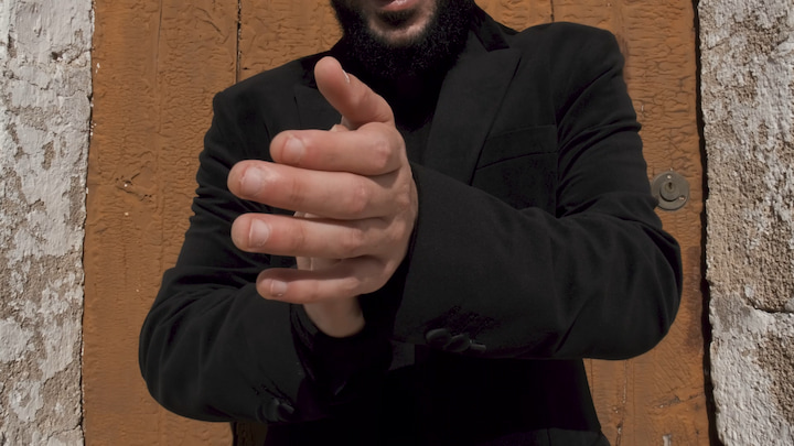 A man doing claps flamenco style