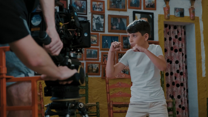 A kid holding a fighting pose