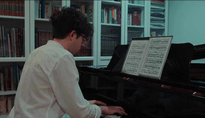 Jaime Espinosa playing the piano