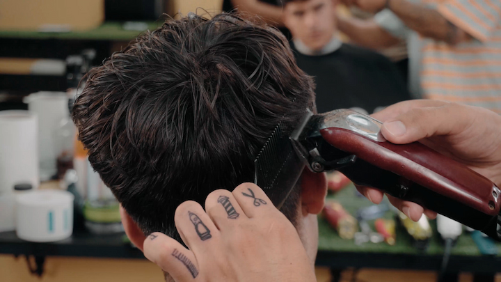 Close up of a client getting a haircut